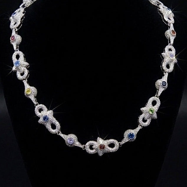 18k white gold plated iced multi shape necklace.