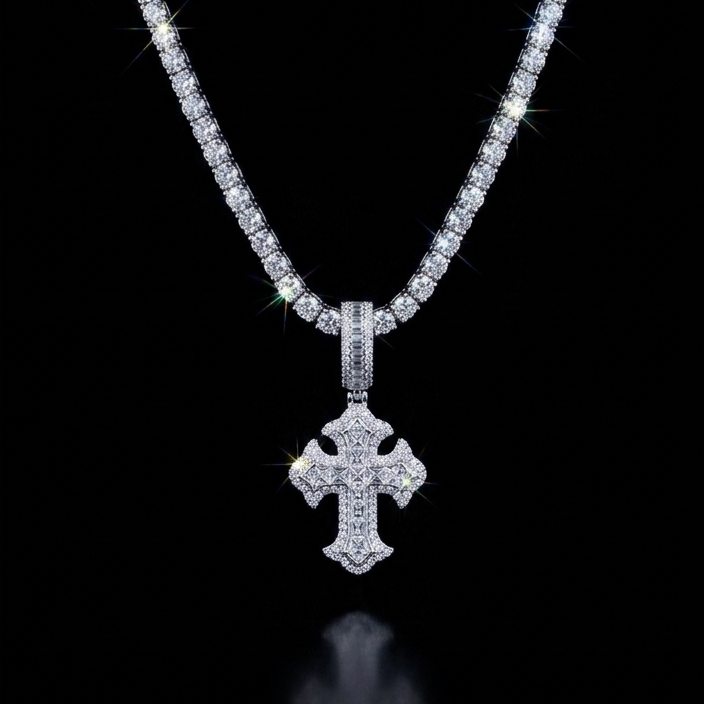 White gold plated tennis chain and iced cross pendant.