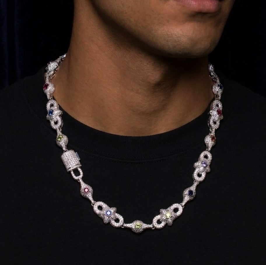18k white gold plated iced multi shape necklace.