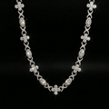 18k white gold plated iced multi shape necklace.