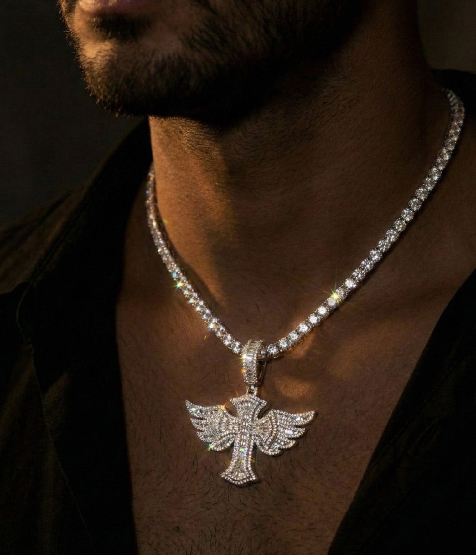 18k white gold plated tennis chain and iced cross pendant.