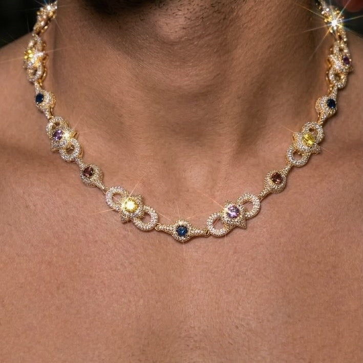 18k white gold plated iced multi shape necklace.