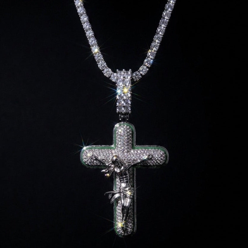 White gold plated tennis chain and icy cross pendant.
