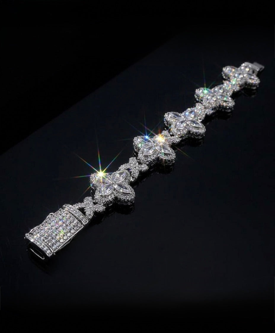18k white gold plated four leaf iced bracelet.