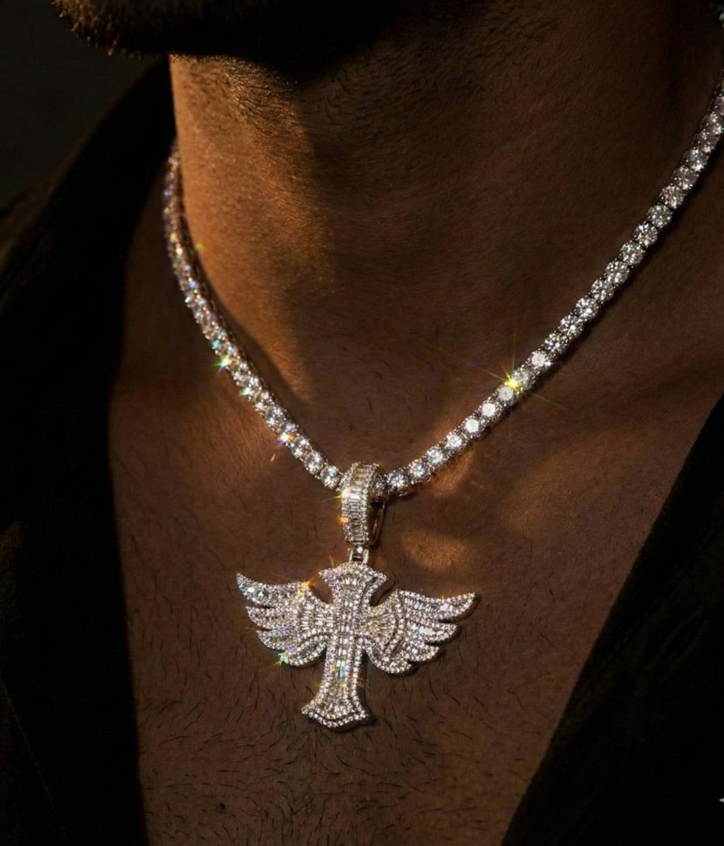 18k white gold plated tennis chain and iced cross pendant.
