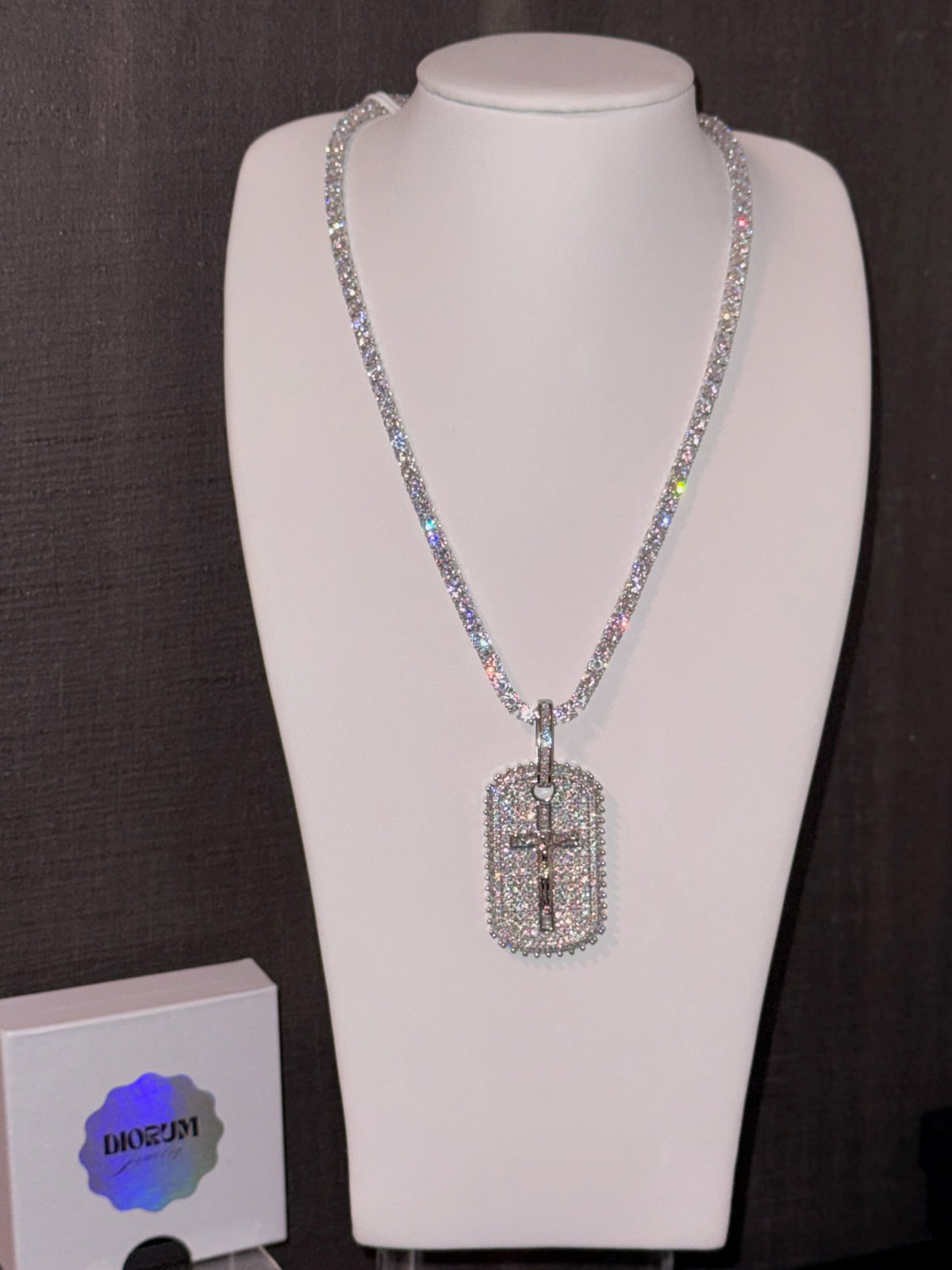 18k white gold plated iced cross tag pendant.