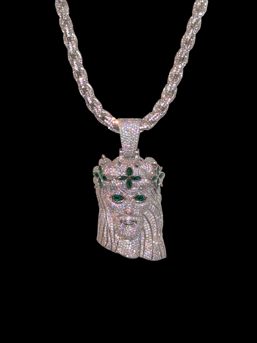 White gold plated iced rope chain and god face pendant.