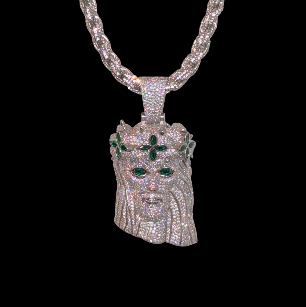 White gold plated iced rope chain and god face pendant.