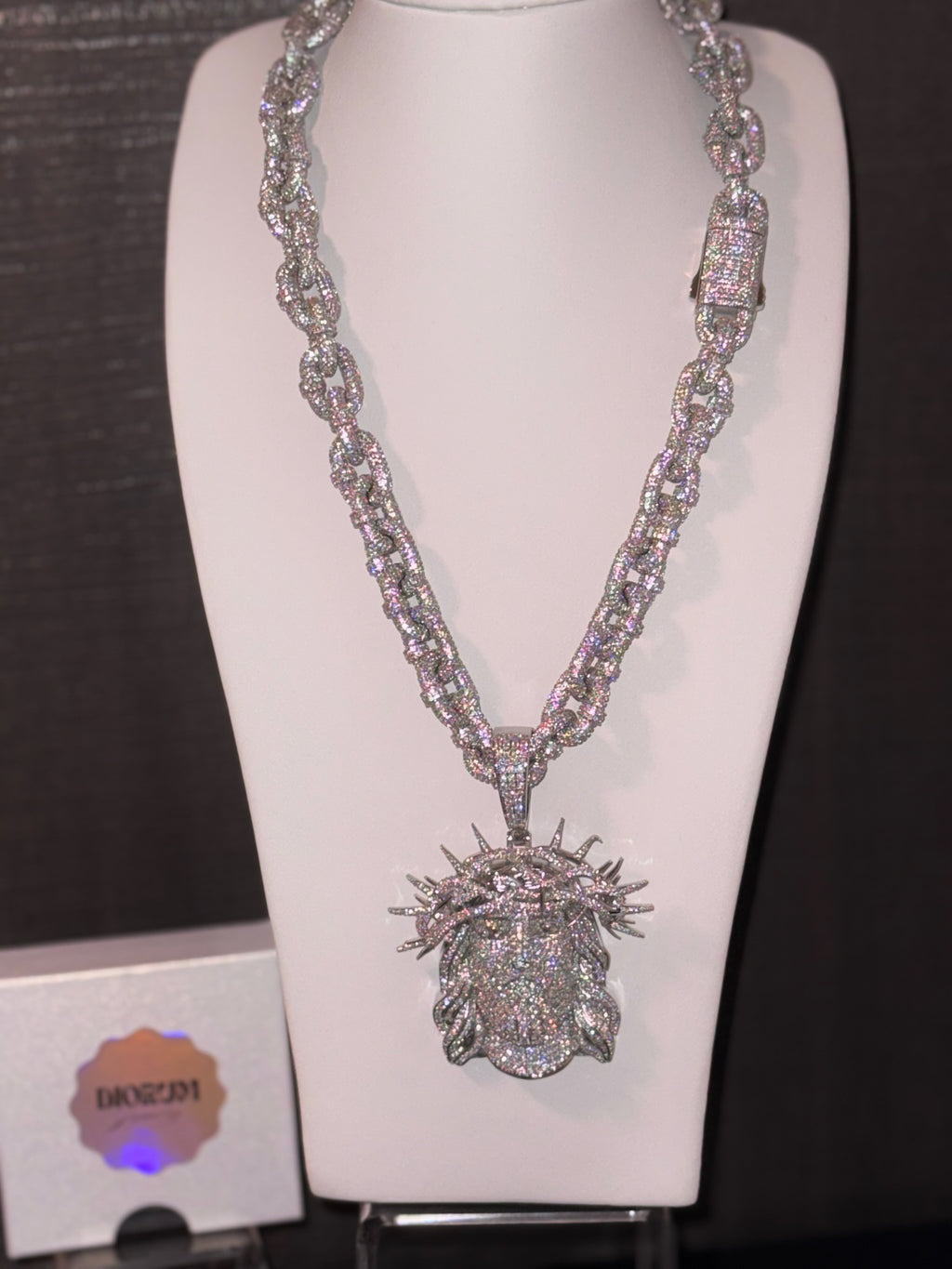 White gold plated iced link necklace and Micro pave god face pendant.
