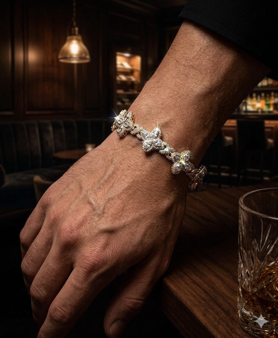 18k white gold plated four leaf iced bracelet.