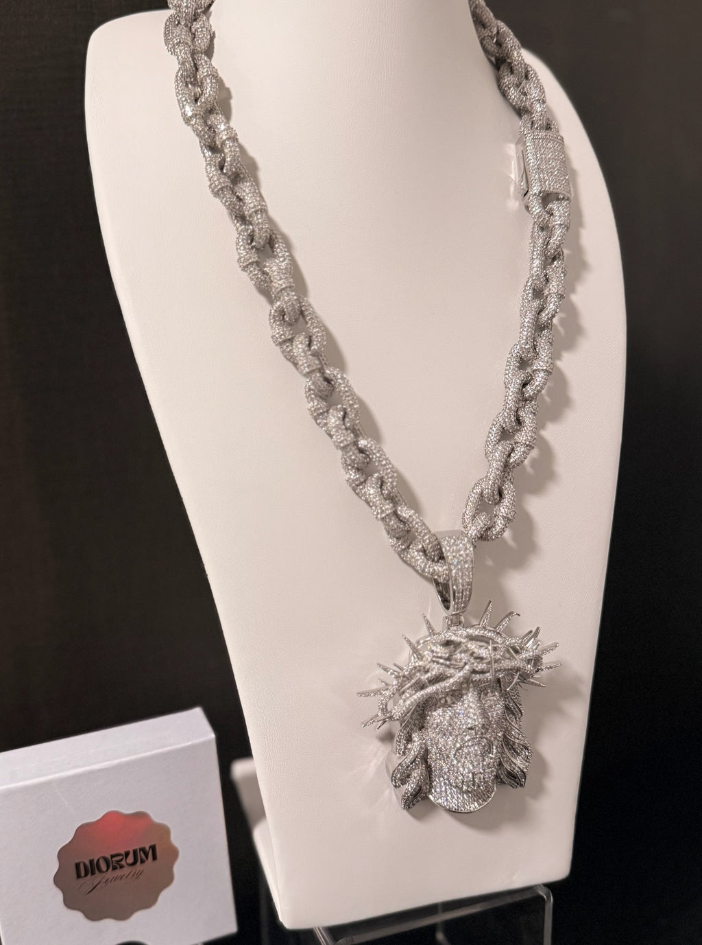 White gold plated iced link necklace and Micro pave god face pendant.