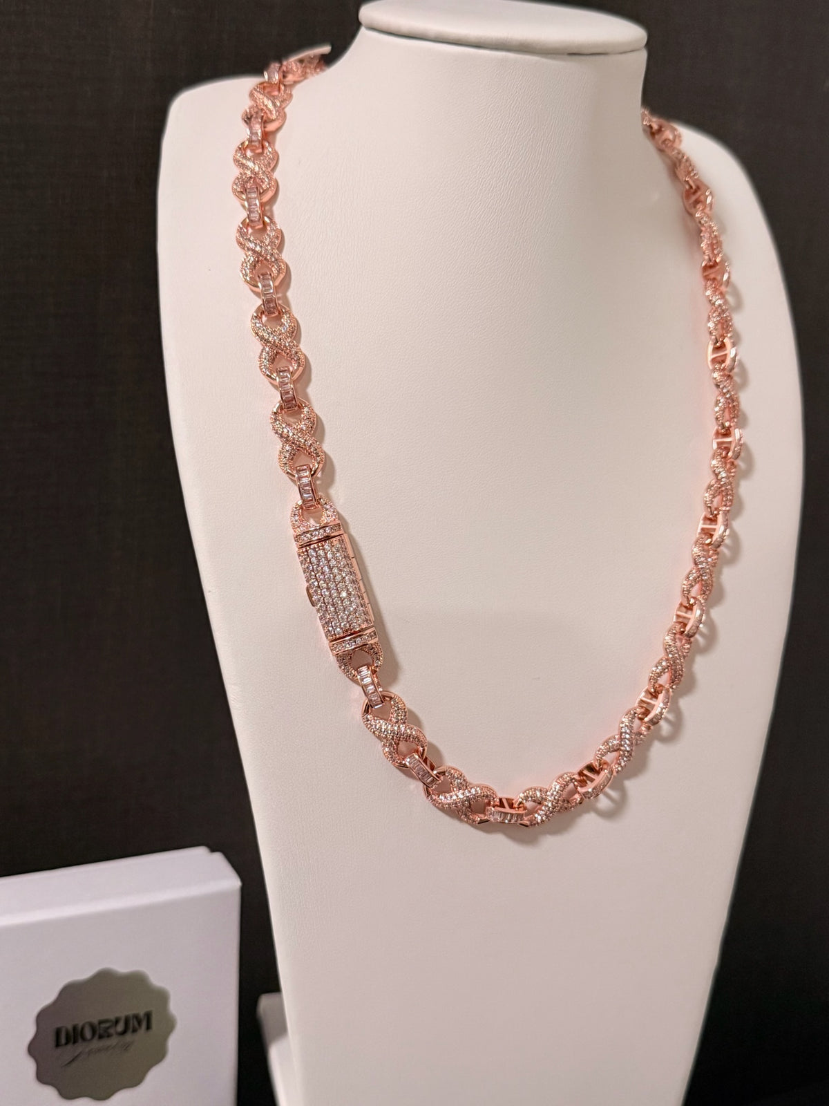 18k white gold plated iced infinity necklace.