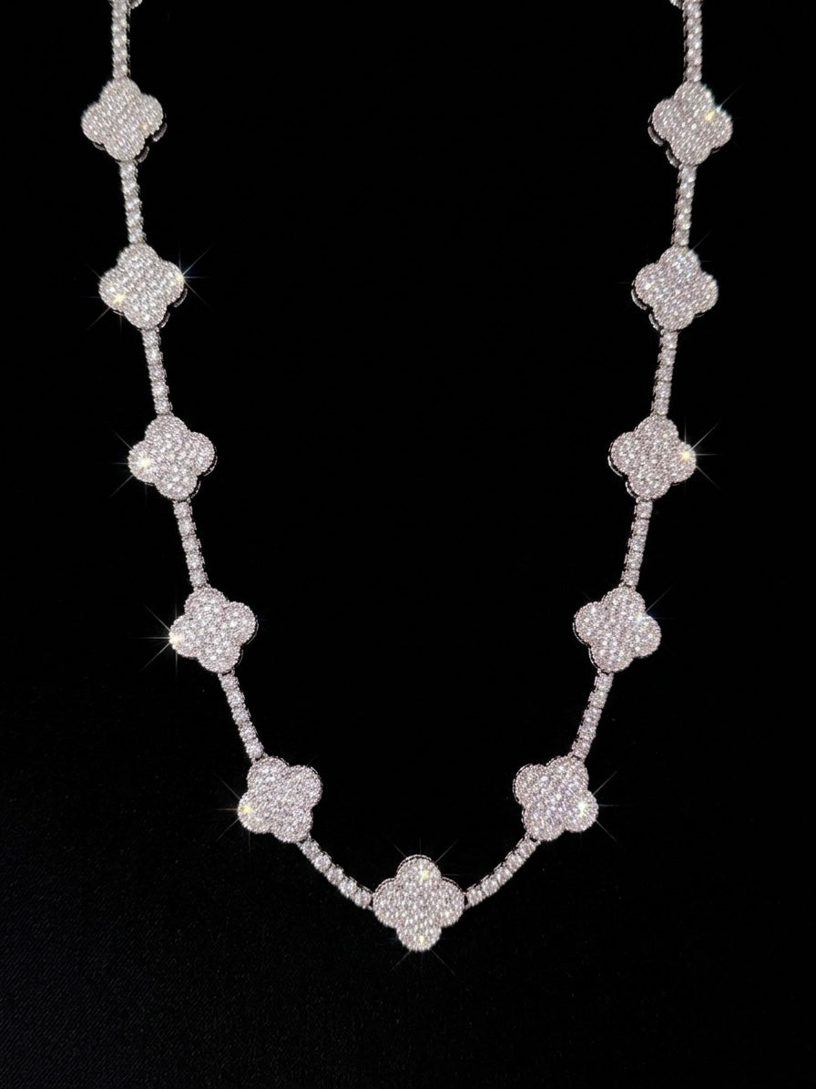 18k White gold plated micro pave clover necklace.