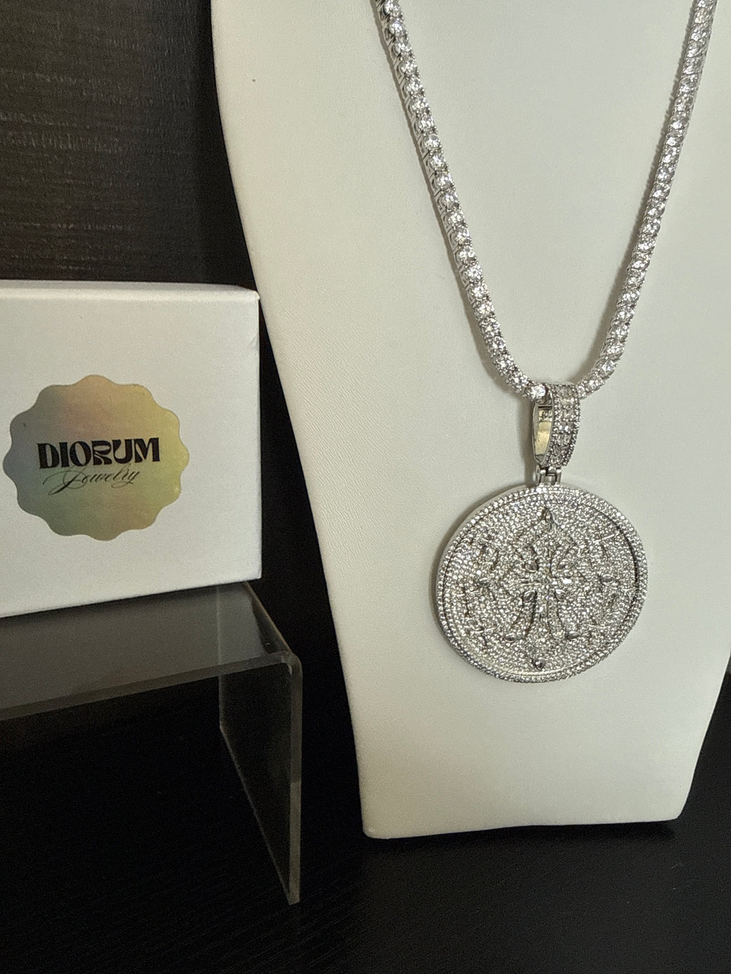18k White gold plated tennis and coin pendant.