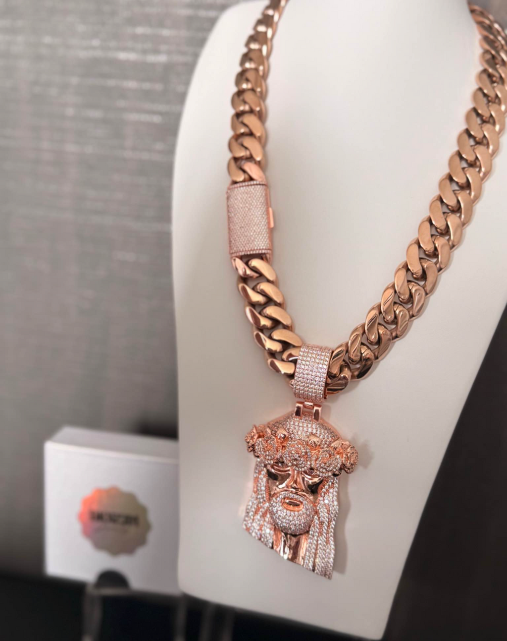 Stainless steel 18k rose gold plated Cuban link and Jesus pendant.