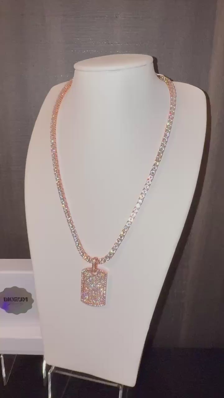 White gold plated tennis necklace and iced tag pendant.